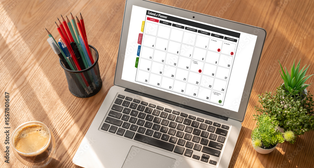 Poster calendar on computer software application for modish schedule planning for personal organizer and on