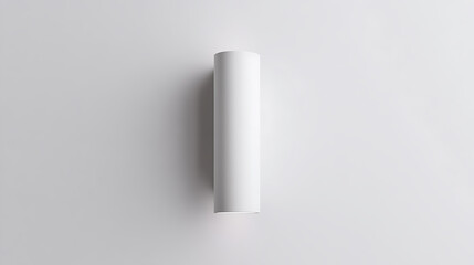 Sleek white cylinder flush-mount wall light with soft shadows on a light gray wall, minimalist design, modern interior lighting, elegant simplicity.