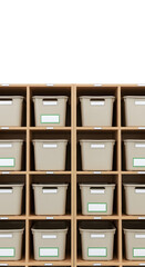 Organized storage: Beige plastic bins neatly arranged in a wooden shelving unit, each with a label.