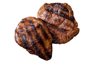 Grilled beef steak meat with salt and pepper. Beef steak grilled on a barbecue