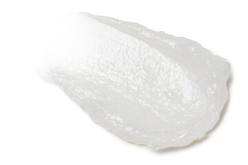 Narrow smear of white moisturizer on empty background