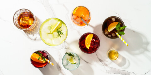 Alcohol cocktail drinks at white background.
