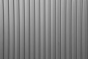 white silver grey gray Corrugated metal texture surface of fence wall. Warehouse Exterior Silver Building Wall Texture Background, Construction Material Backdrop Design White Aluminum Corrugated Metal