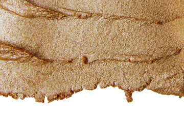 Wide bronze smear with reflective texture on white background