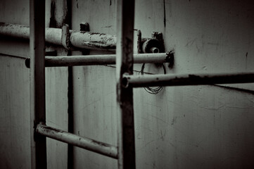 Iron gates, bolts and an iron staircase, abstract photography, spatial geometry, photography...