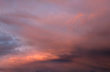 Sunset time, the sun painted the sky with clouds and created a beautiful celestial landscape, a...