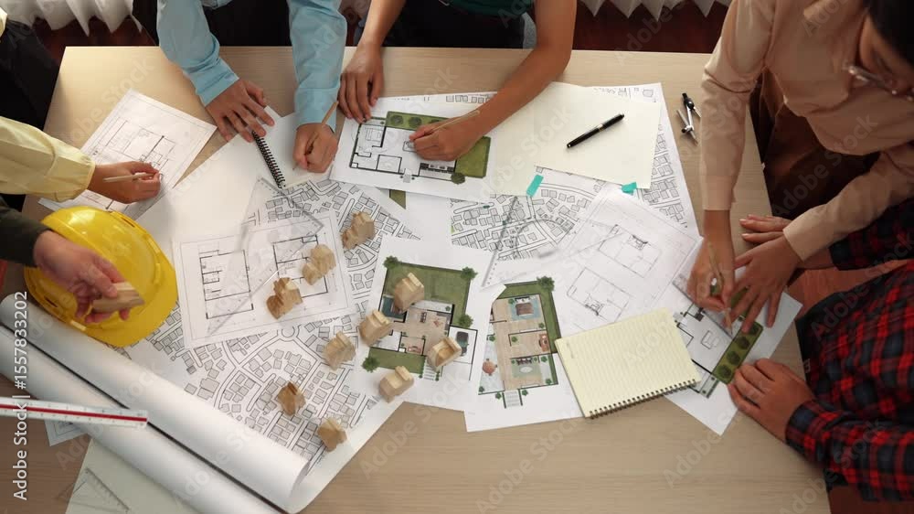 Aufkleber architect and safety engineer discussion about building construction use blueprint on table with arc
