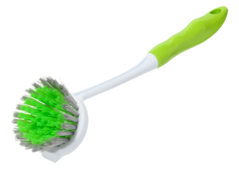 Green plastic brush for washing dishes or cleaning with long white handle, isolated background.
