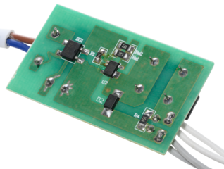 Green electronic board with various components and several wires connected, isolated on background