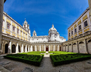 Fototapeta premium Courtyard of the Mafra National Palace, Convent and Basilica. Baroque architecture at Mafra in Portugal.