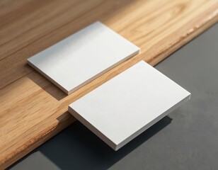Minimalist business card mockup presentation on wood background. Clean white blank cards branding stationery design template. Elegant company identity showcase, advertising promo.