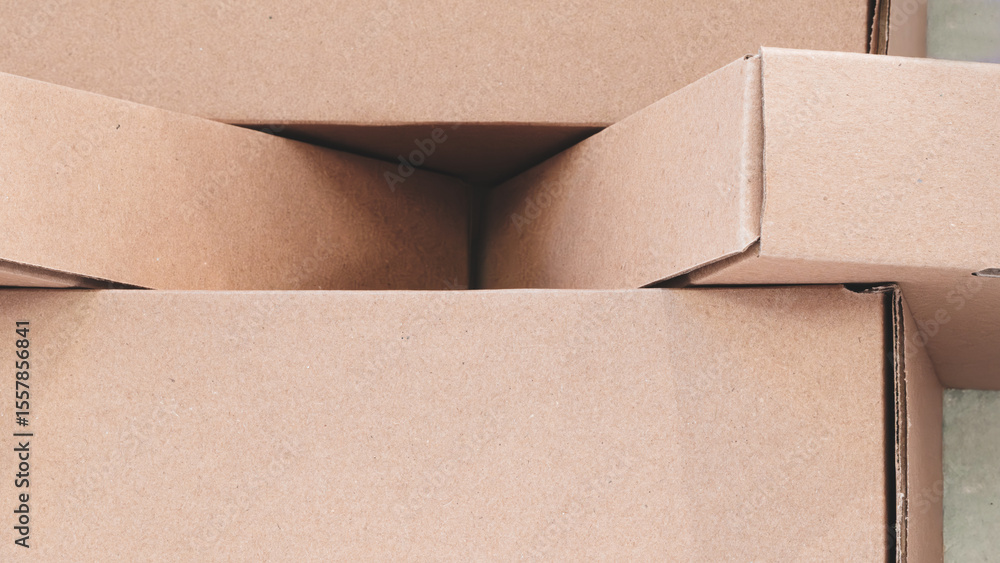Poster a stack of brown cardboard boxes for packaging as background for template pages and banners delivery