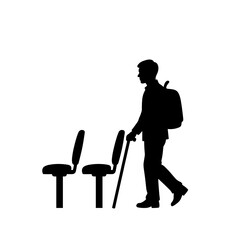 Man walking with cane beside airport seating concept of Accessibility Support  