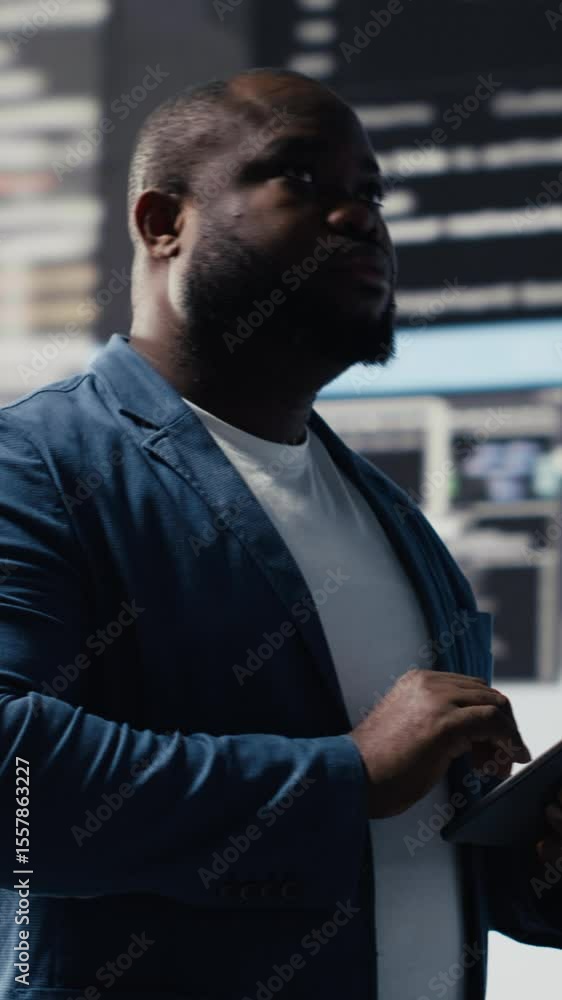 Poster vertical video african american coder expert immersing in software development for a high tech work 