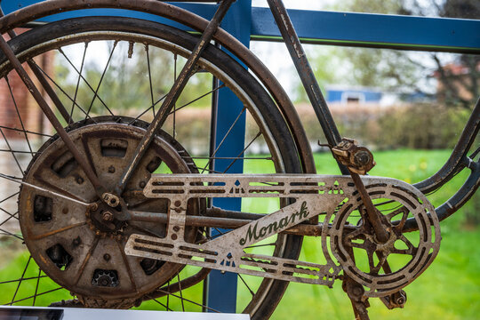 Skara, Sweden - April 20 2025: Old Monark bicycle chain and rear wheel view.
