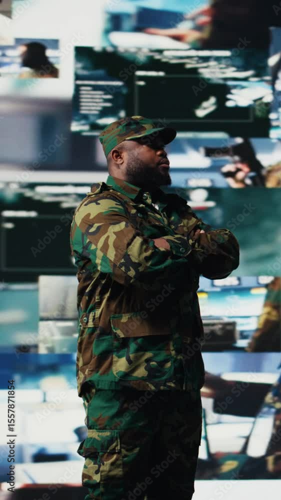 Poster vertical video black soldier operating in a virtual war zone using digital technology and threat det