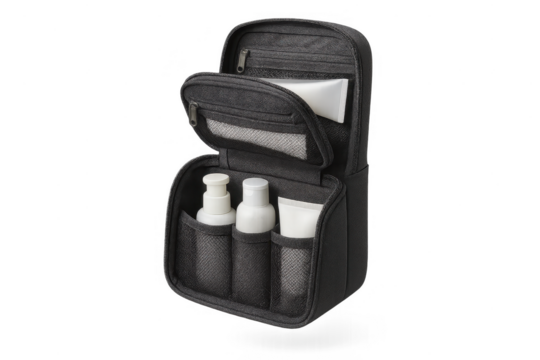 Black open travel toiletry bag with bottles on a transparent background
