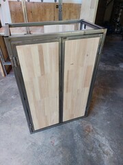 A unique piece of industrial-style furniture made from wood and metal, fully handcrafted and...