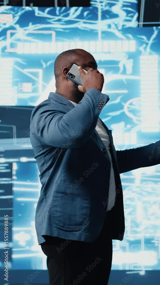 Poster vertical video black entrepreneur using mobile phone call to interact with people, shares insight on
