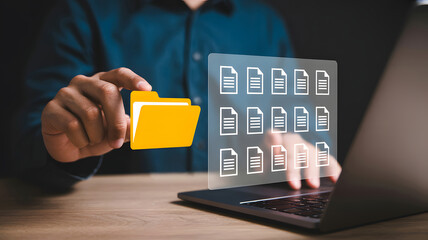 Concept illustration showing a businessman handling digital documents and files on a laptop, organizing data and managing information with ease and efficiency.