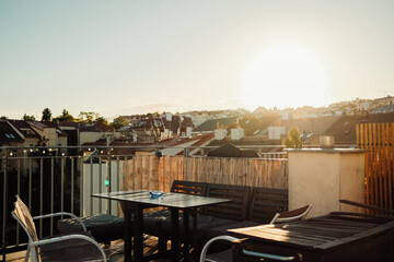 Cozy Prague apartment terrace with view of red tiled rooftops,Czech architecture