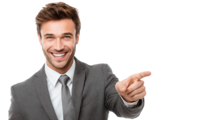 A cheerful businessman pointing and smiling, dressed in a suit against a white background.