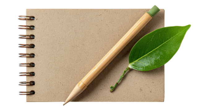 Notebook with a pencil and green leaf, eco-friendly materials, isolated on white background.