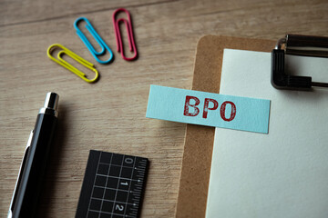 There is sticky note with the word BPO. It is an abbreviation for Business Process Outsourcing as...