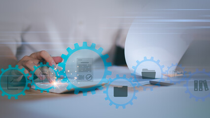 Accountant showing office document auditing concept ,plan review process and assess correctness ,Management of important document storage of organization ,document system ,accountant Audit documents.