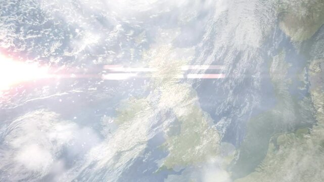 Earth zoom in from space and focus on Erwin, Scotland, North Ayrshire, Great Britain. Background for travel intro or blog. Satellite view. 3D style Animation. Images from NASA.