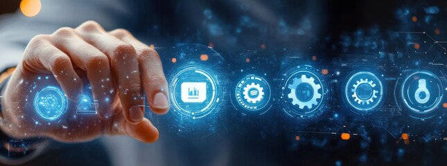 Close-up of human hand interacting with glowing digital interface featuring technology and data analysis icons on futuristic blue background with abstract light particles