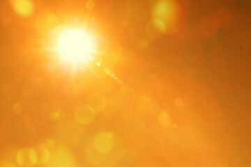 Bright sun in orange sky during hot summer weather. Extremely high temperature