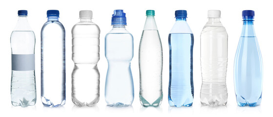 Plastic bottles with water on white background, set