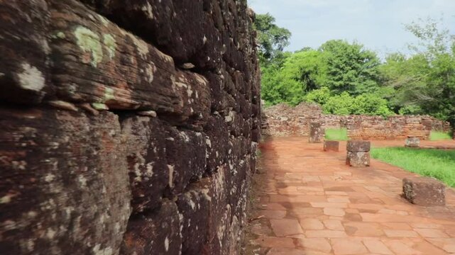 Close-up of the ancient stone walls in the Jesuit residences of San Ignacio Min&iacute;. Erosion, moss, and lichens are visible, highlighting the tranquility, mysticism, and ancestral past of the site.
