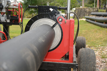 Welding plastic pipe for a hydro unit