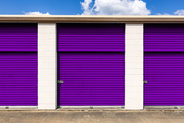 Exterior self storage units with purple doors