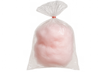 Pink cotton candy sealed in transparent packaging, highlighting soft sugary texture against clear background, perfect for graphic design use