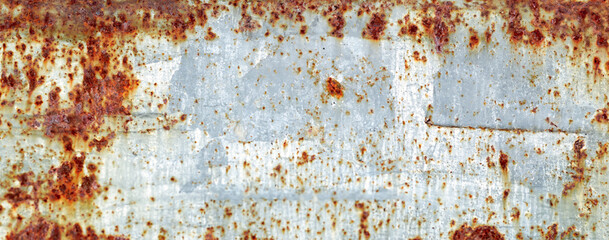 Rusty White Metal Surface with Flaking and Corrosion