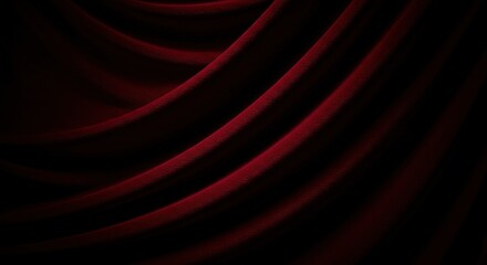 Fototapeta premium Close-up view of deep maroon fabric draped in folds.