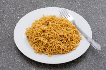 Fried instant noodles with fork