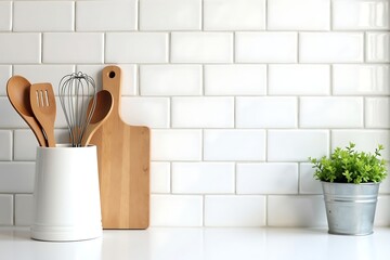 Modern kitchen utensils and decor on white countertop with subway tile backsplash stock photo image design 