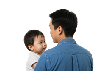 Father Holding Baby in Casual Setting Focused on Family Bonding and Care