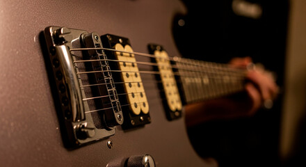 Fototapeta premium Close-up View of Electric Guitar with Focused Details 