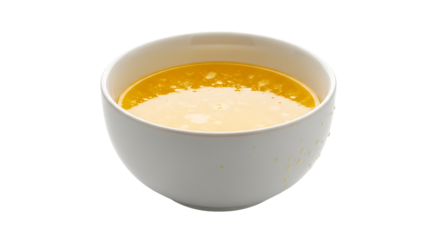 Creamy yellow soup in a bowl.