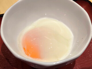Onsen Tamago eggs in a White Bowl