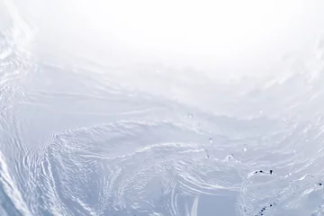 Fotobehang 青の背景に流れ落ちる水. © kei907