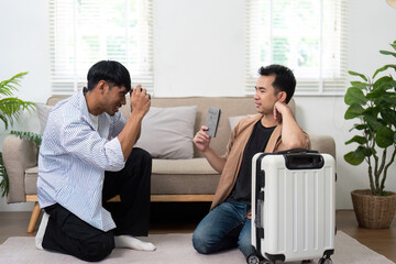 Planning and Travel. A couple discussing their travel plans while preparing for an exciting trip together.