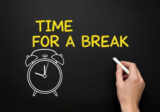 A hand writes time for a break on a chalkboard next to a drawn alarm clock
