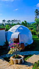 glamping tent view with blue sky background