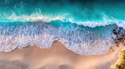 Obraz premium Turquoise ocean waves under soft sunlight, a serene summer seascape. Peaceful beauty of nature's calm waters.